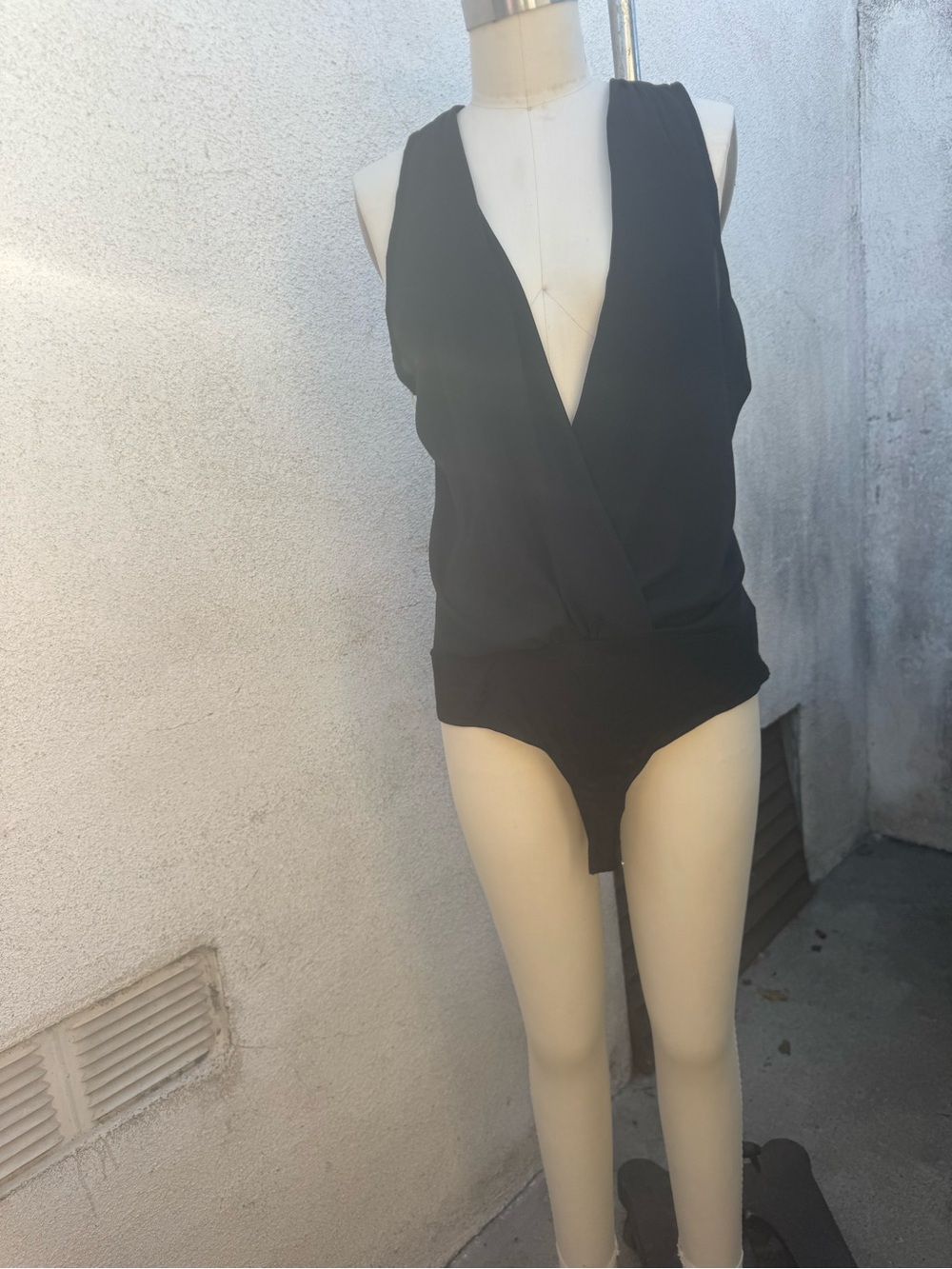Charlotte Russe Black Sleeveless Surplice Bodysuit